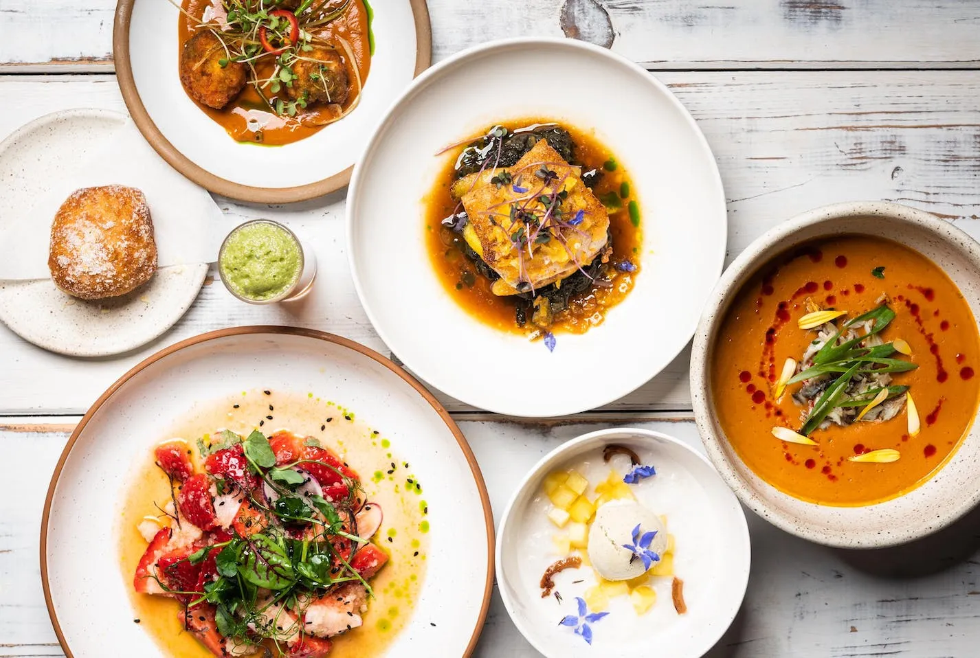 Dakar Nola signature dishes A seasonal seven-course pescatarian tasting menu that changes often. Dishes may include Gulf shrimp and smoky jollof rice.